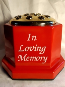 Red square in loving memory urn
